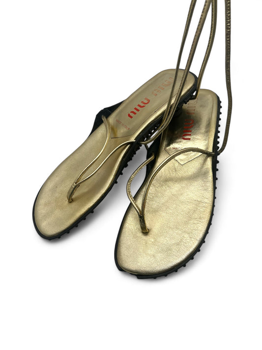 Miu Miu gold flip flops with bubble sole