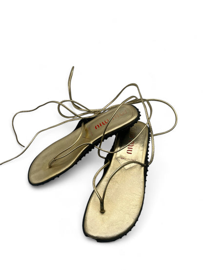 Miu Miu gold flip flops with bubble sole