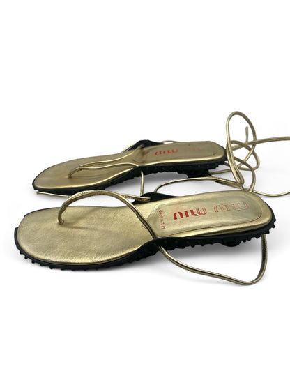 Miu Miu gold flip flops with bubble sole